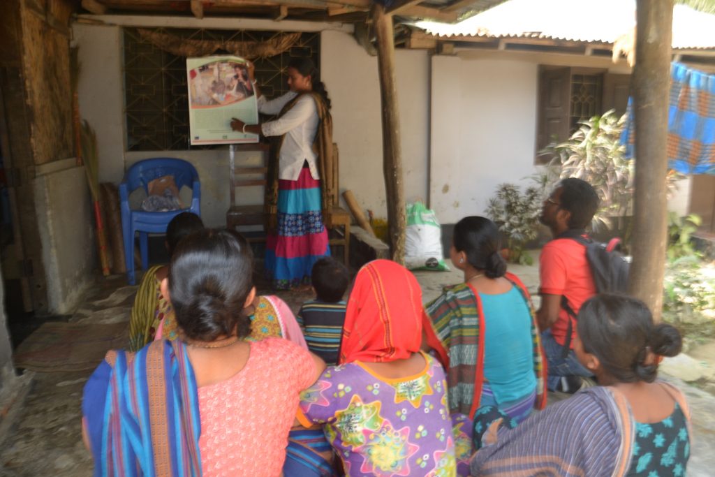 Suporna counselling women in her village